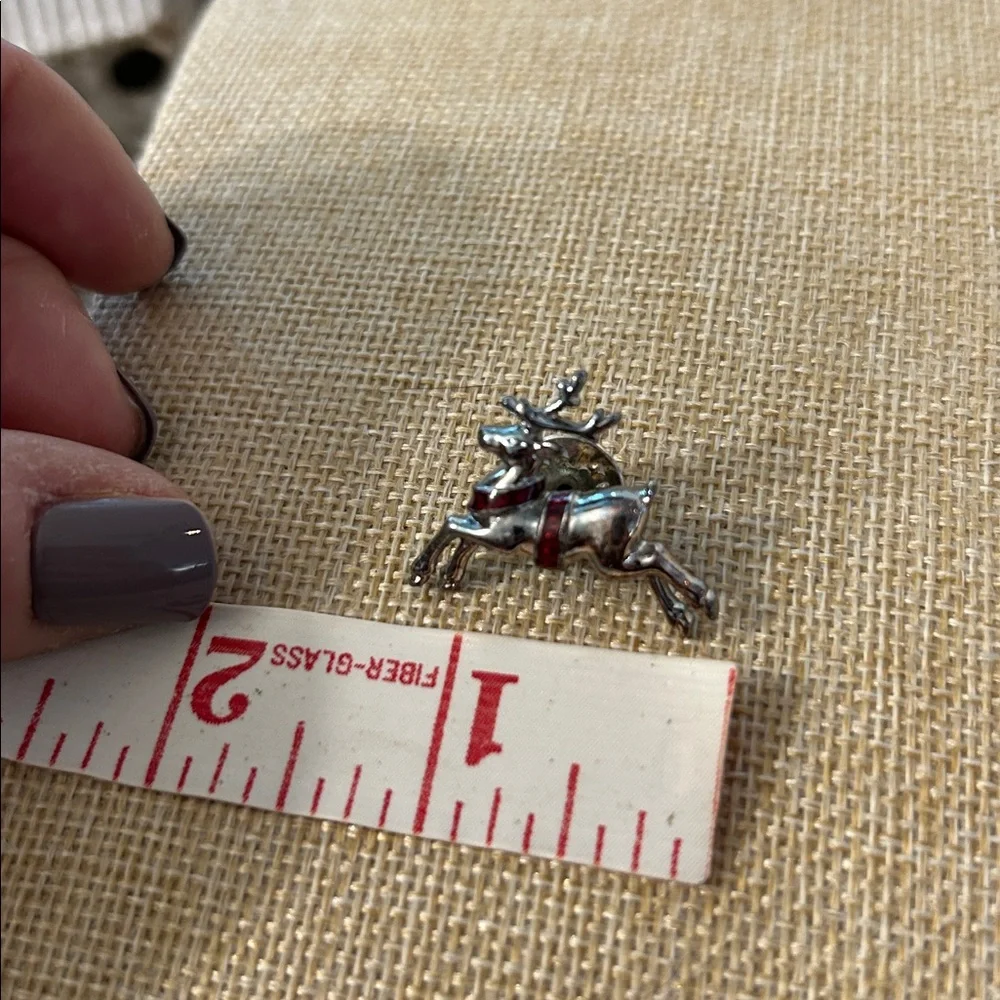Avon Reindeer pin Christmas silvertone reindeer with red enamel brooch
